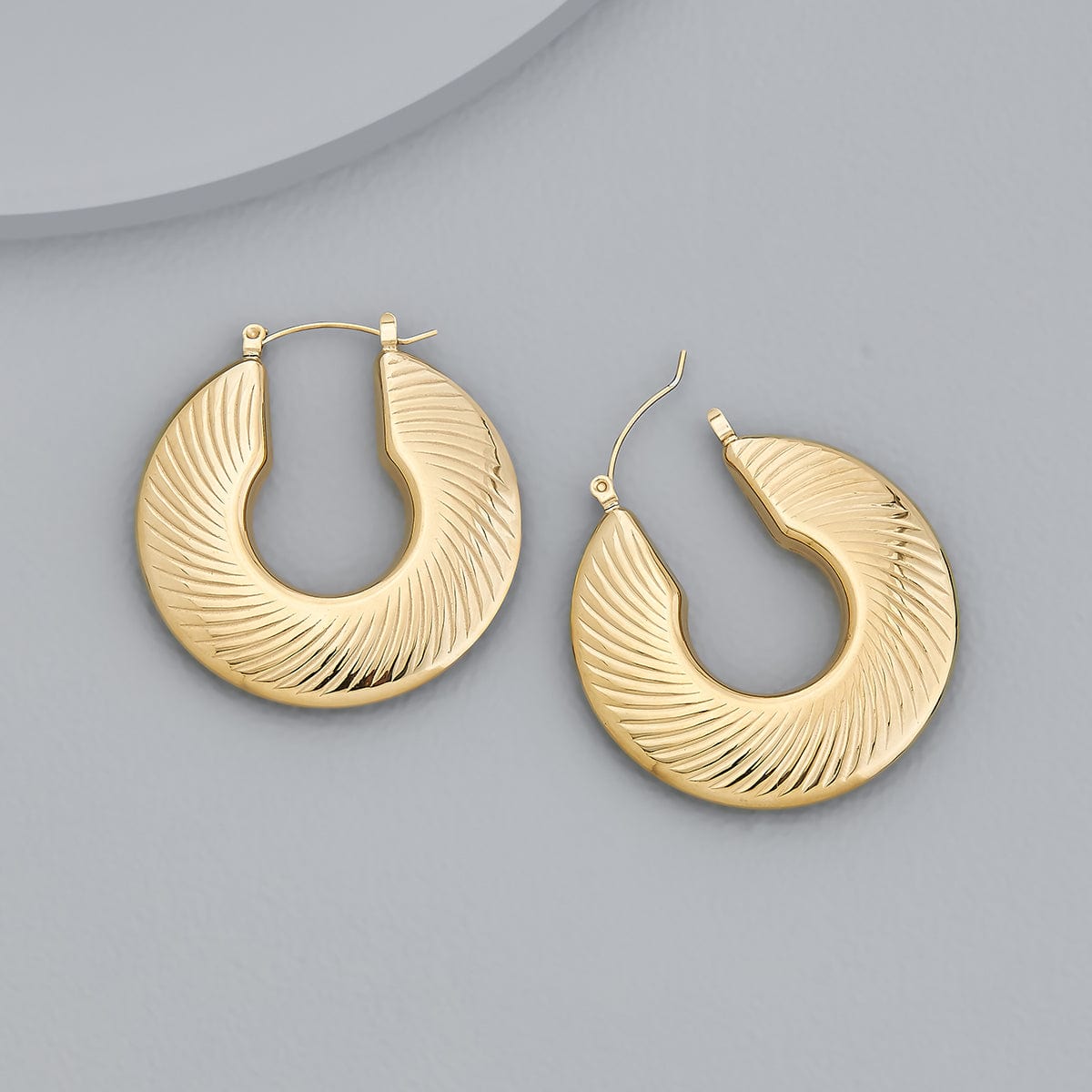trendy-earring-gold-trendy-earring-172095-38277563121820.jpg